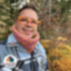 Man wearing thick crochet cowl.