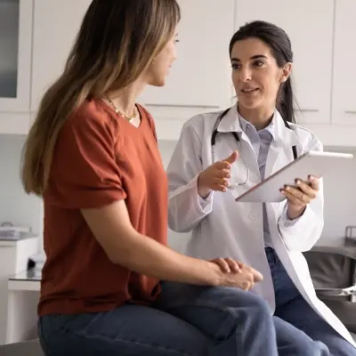 Female patient with doctor
