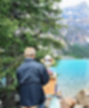 Randall shier painting outside at moraine lake