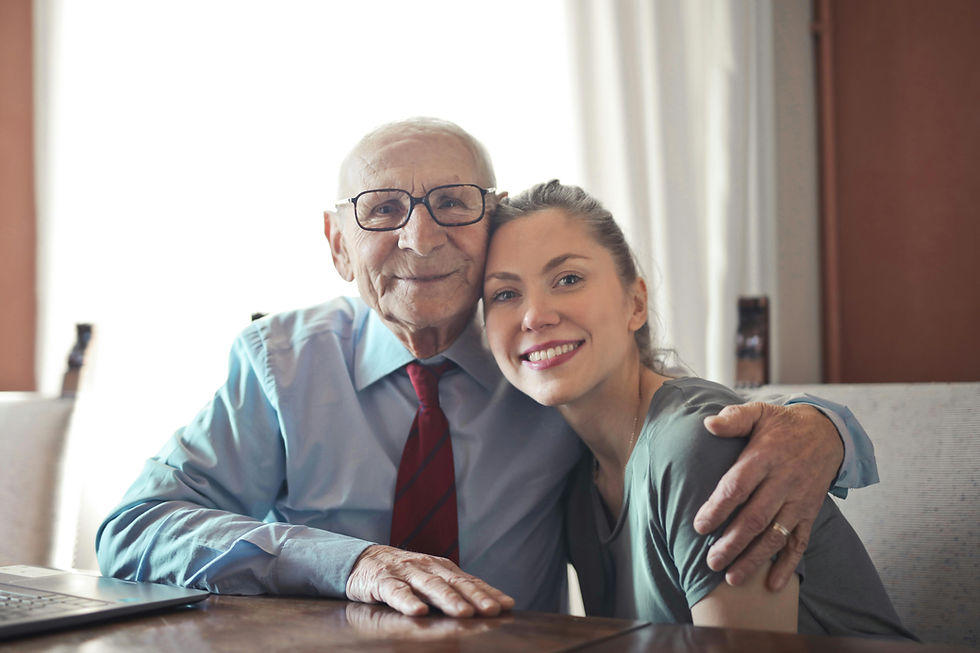 woman and elderly man smiling
