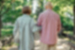 Middle-aged couple walking arm in arm