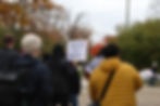 Student holds sign that reads "Immigrants built America” at protest // Reena Hamad 