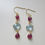 Thumbnail: Ruby and Blue Topaz Triple Tier Earrings