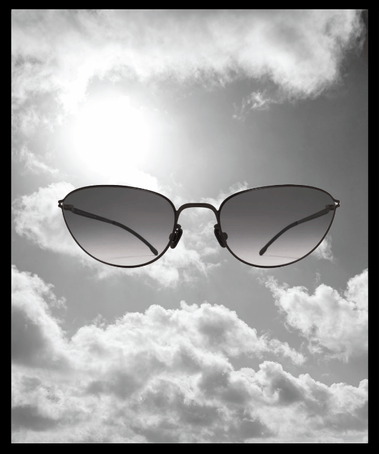 Handmade lightweight stainless steel sunglasses from Berlin with a refined minimalist design and comfortable fit.