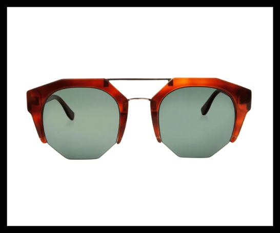 Chunky angular clubmaster sunglasses with bold frames, extended lenses, and metallic accents.