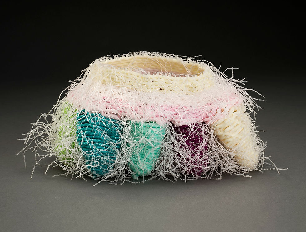 A contemporary vessel by Sausalito basket artist, Emily Dvorin, made from deconstructed mesh bath po