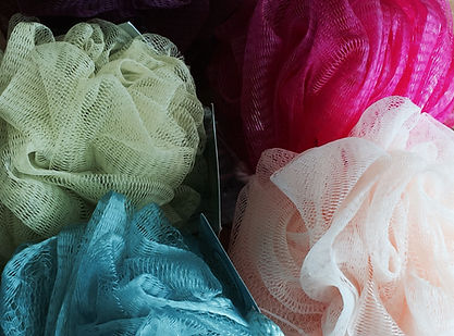 Bath poofs to be used to create a contemporary vessel by Sausalito basket artist, Emily Dvorin.