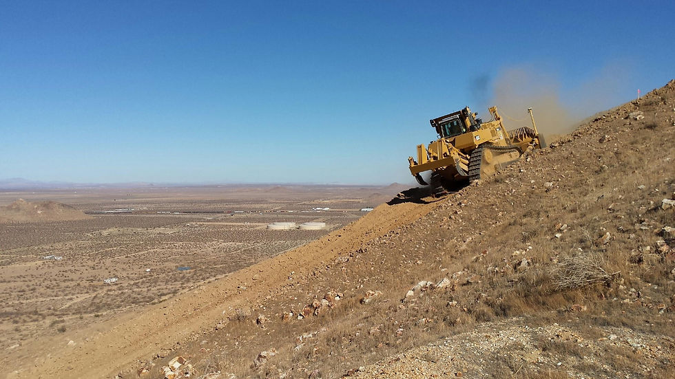 CK Earthworks equipment performing hillside excavation and steep-terrain grading.