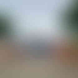 Meredith Peters visiting Parque del Amor in Lima Peru beside the colorful mosaic mural