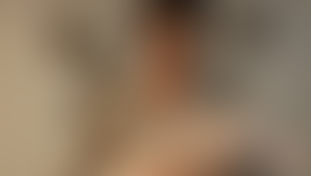 A mother holding a baby. 