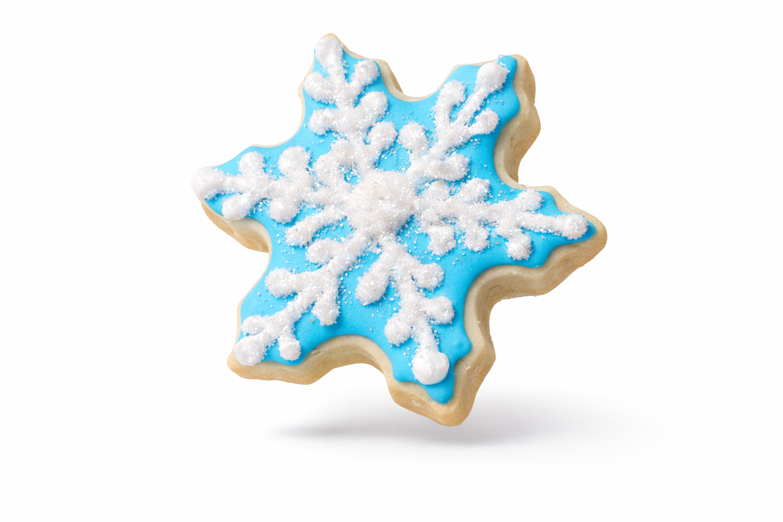 Snowflake sugar cookie with light blue icing and white design.