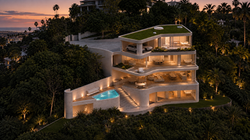 Seaforth house at dusk with warmly lit terraces and pool