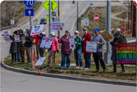 Eagle County residents take to Edwards roundabout for National Day of Action rally