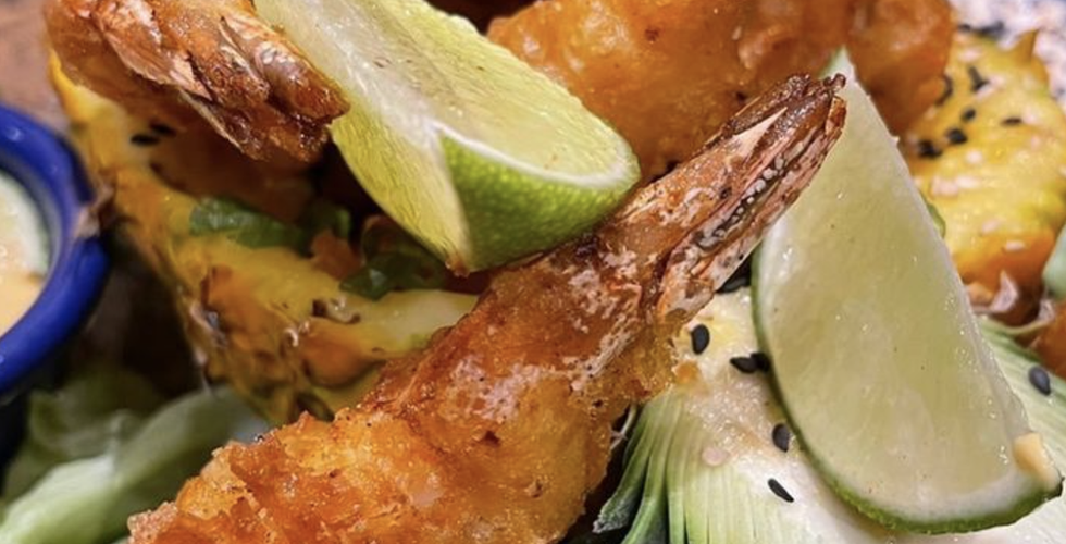 Turia restaurant’s specialty paella presented on a traditional pan ready to serve.