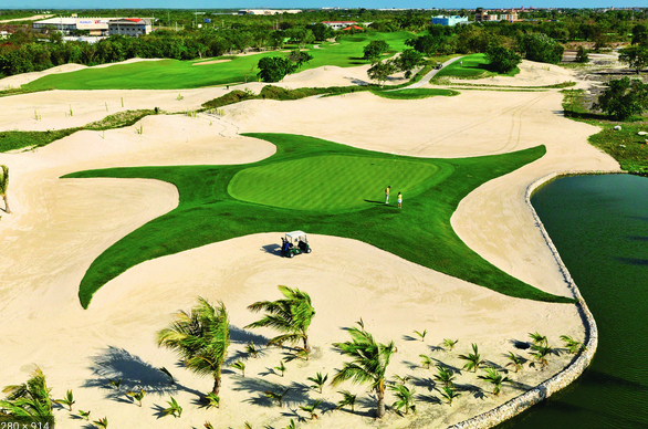 Golf course terrain at Ibero State with strategic bunkers and open fairways in a tropical setting