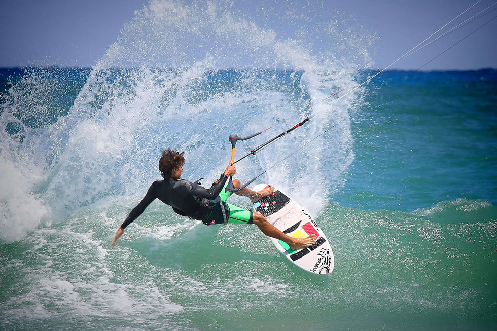 Adventure enthusiast windsurfing in vibrant blue waters of a Caribbean lagoon