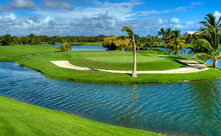 Lush green fairways and water hazards at The Lakes at Barcelo, redesigned by P.B. Dye