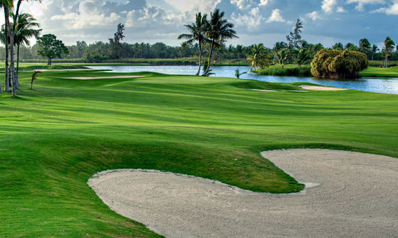 Lush green fairways and water hazards at The Lakes at Barcelo, redesigned by P.B. Dye