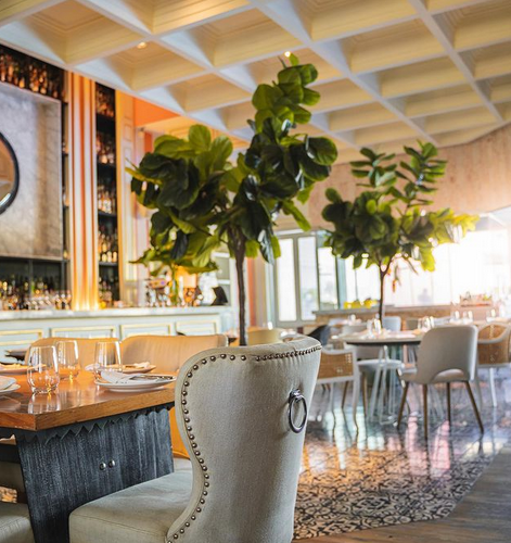 Interior of SBG Punta Cana, a modern dining space with elegant decor, serving a variety of international dishes and providing a chic atmosphere for guests.