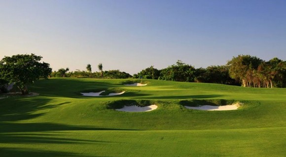 Undulating fairways and native grasses at Hard Rock Golf Course in Cana Bay, Dominican Republic