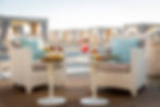 Sunset dining at Alpemare Beach Club for luxury suite guests