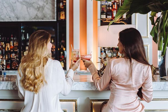 Guests enjoying a meal at SBG Punta Cana, with beautifully presented dishes and an inviting ambiance perfect for a casual yet refined dining experience.