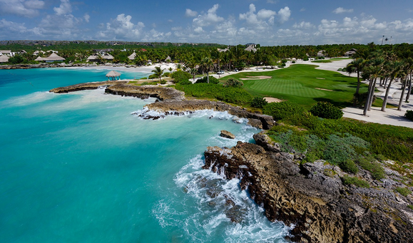 Expansive coastal landscape featuring Punta Espada Golf Course with ocean views at every hole