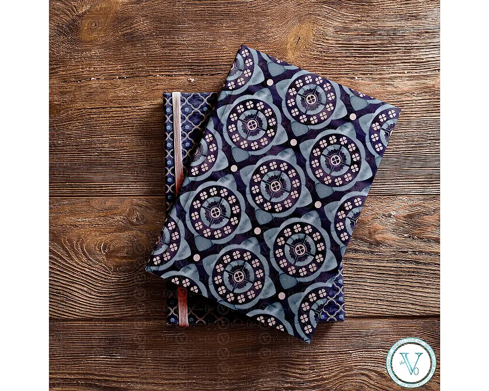 Thumbnail: Notebook mockup, stacked with navy and pink circular medallion patterns, wood surface, Vanessa Olink Art logo