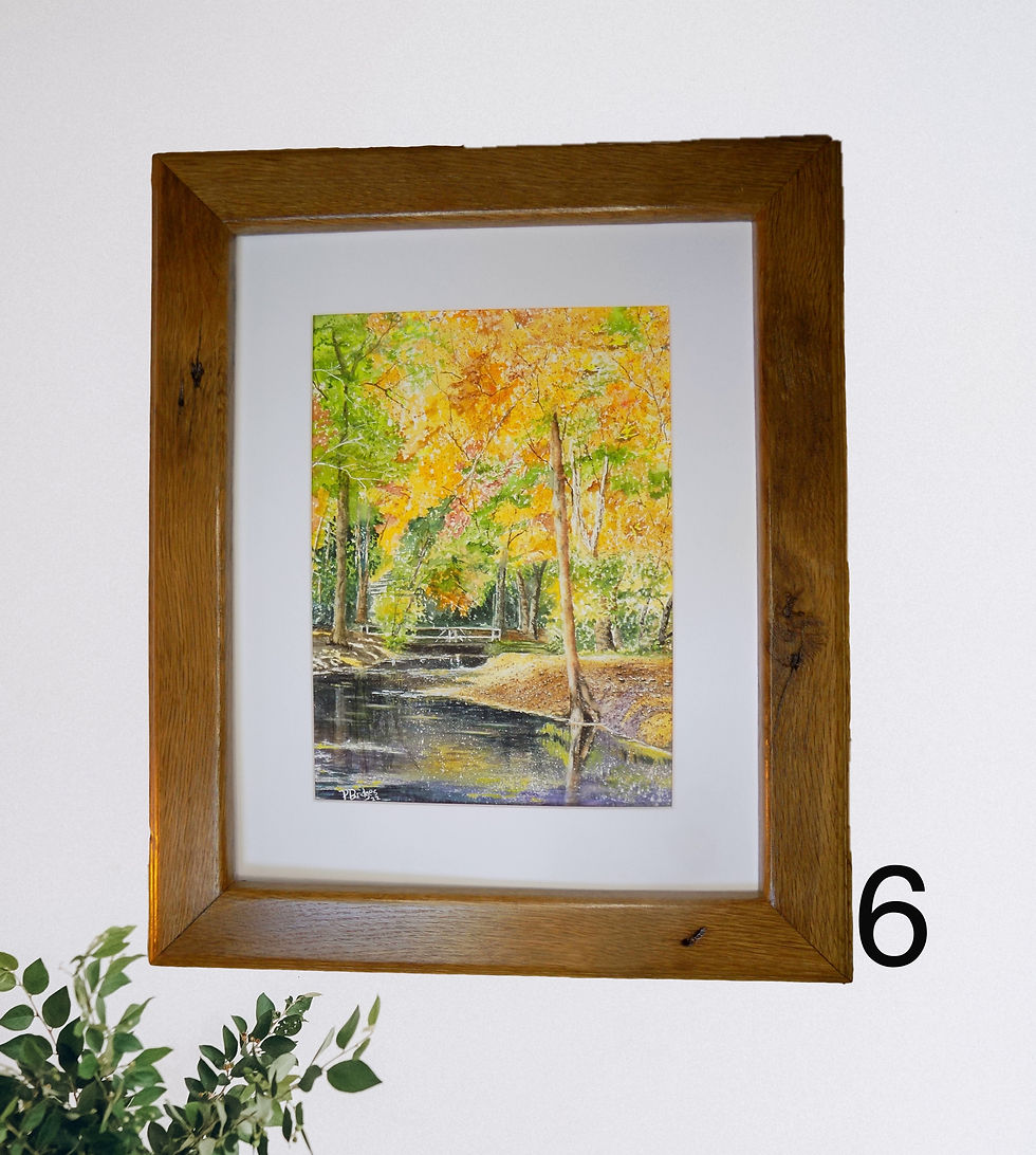 Thumbnail: Watercolor of an autumn scene reflected in the creek. Painting displayed on a wall.