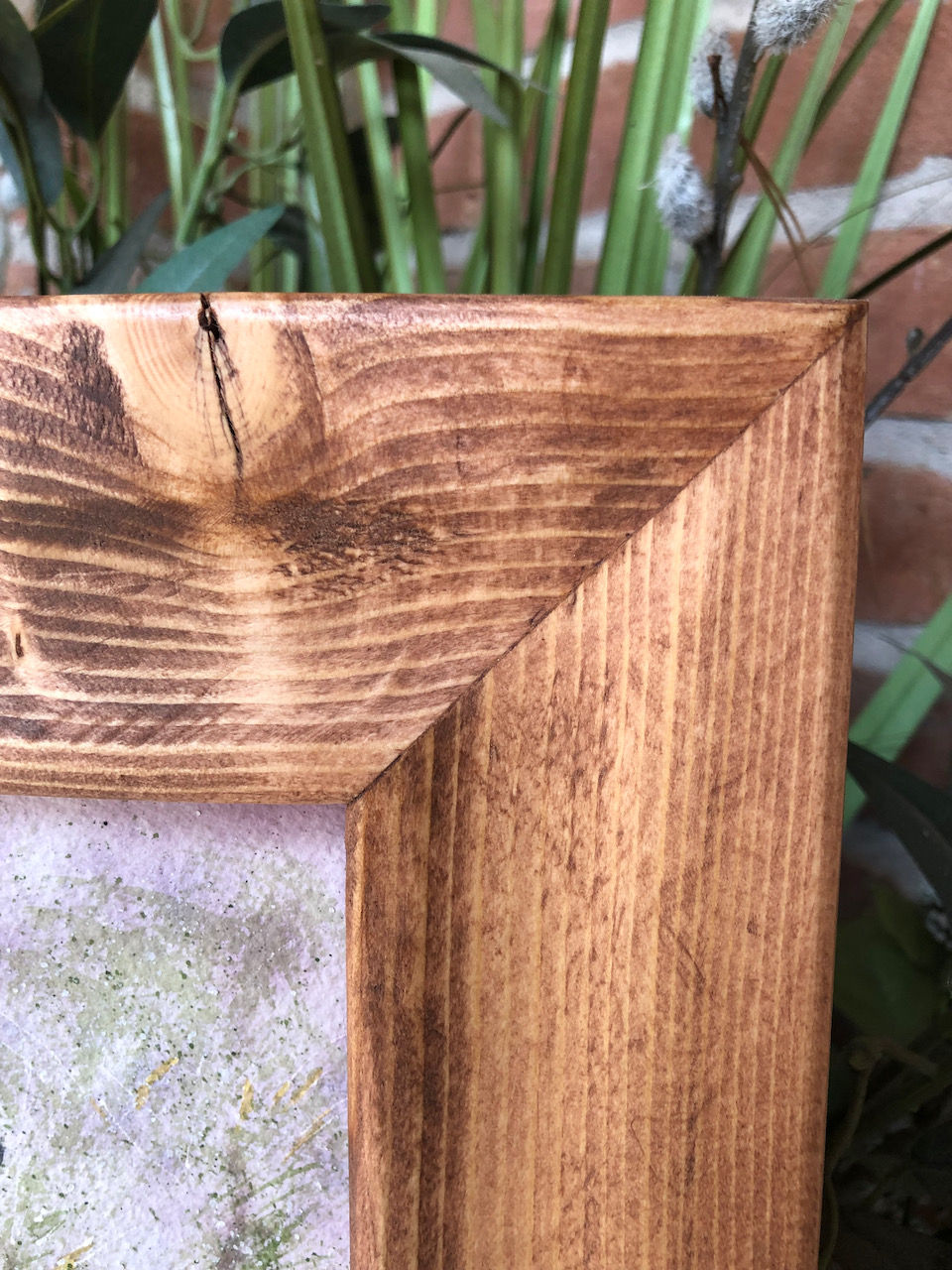 Thumbnail: close up of custom frame.
