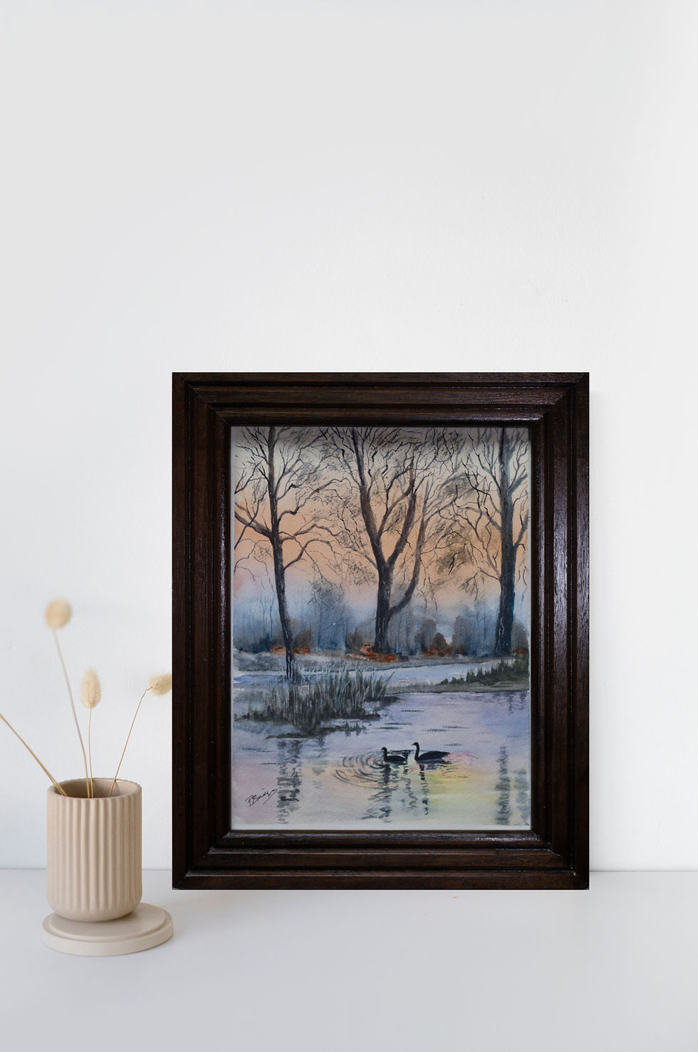 Thumbnail: Orange sky reflected in lake with black swans.