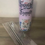 Thumbnail: 20 ounce skinny tumbler with lid, 2 straws, and straw brush.  
