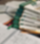 Stack of AP Prep books lying next to study notes.