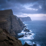 Dramatic coastal cliffs of Suðuroy island, Faroe Islands. Photograph by Andrija Ilic.