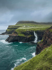 Múlafossur waterfall in Gásadalur village, photographed as a classic Faroe Islands landscape composition.