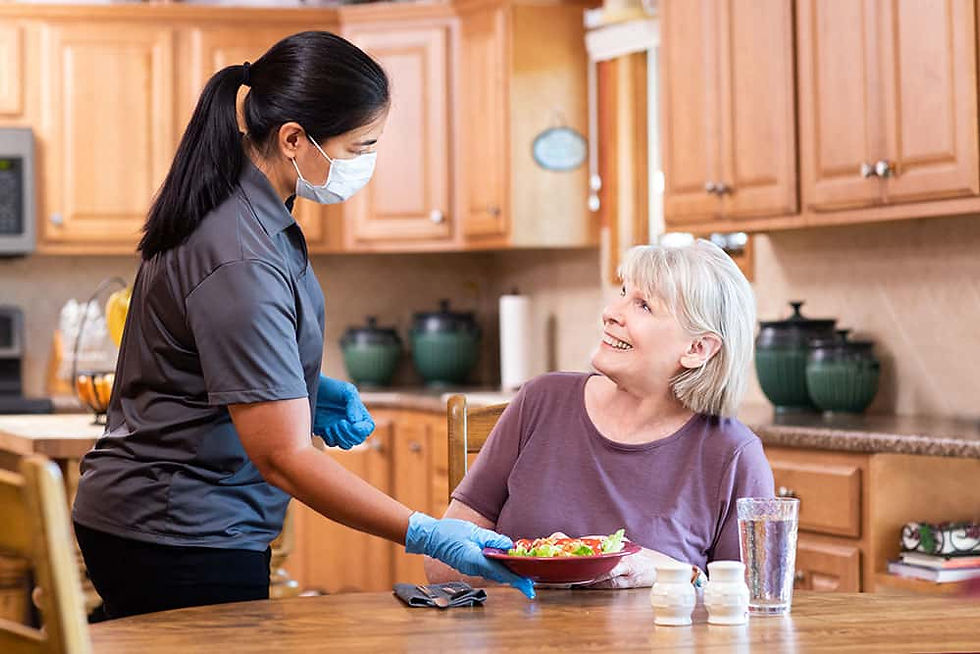 Senior man looking out of his New Jersey home window; Senior woman engaging in a group activity in a New Jersey nursing home