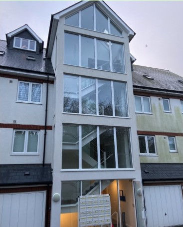 Window Cleaning Hastings for high-level windows on a multi-storey residential building