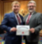 Justin Beanard for WV House of Delegates holding a certificate.