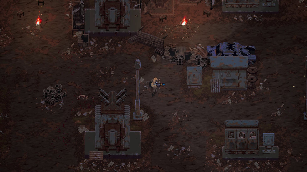 Scavland player exploring a ruined industrial wasteland with a rifle among wrecked vehicles, machinery, debris and burning barrels.