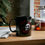 Thumbnail: Raven and Skull - Black Ceramic Mug