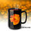 Thumbnail: Black ceramic mug featuring a bright golden poppy blossom illustration on both sides.