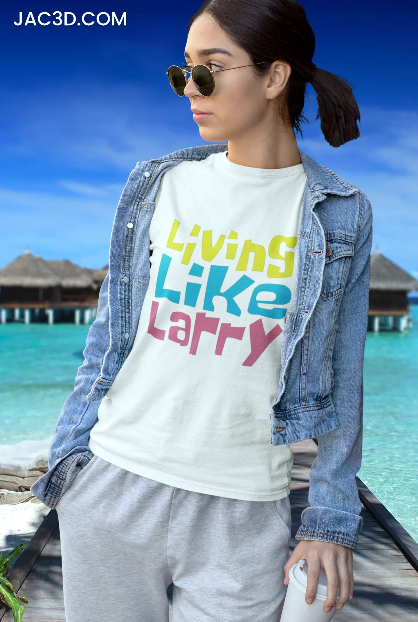White "Living Like Larry" t-shirt based with a tropical resort background