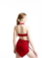 Dancer in sleeveless leotard striking a ballet-inspired pose.