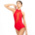Dancer wearing a bright red halter leotard with curved sheer mesh panel, arm raised, on white.