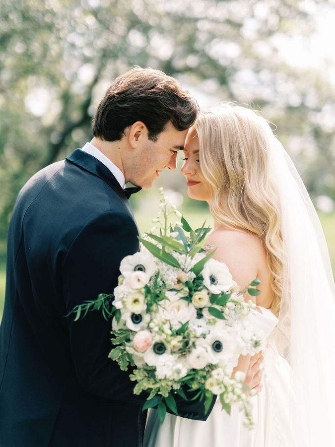 Bride and groom portrait in soft evening light at The Chapel at Gruene