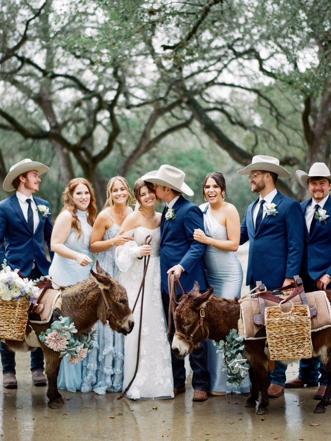 Wedding party with beer burros at The Chandelier of Gruene wedding in New Braunfels