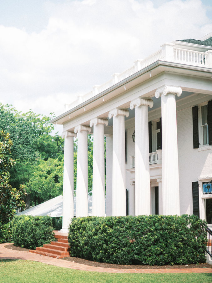 Historic exterior of Woodbine Mansion in Round Rock, Texas.