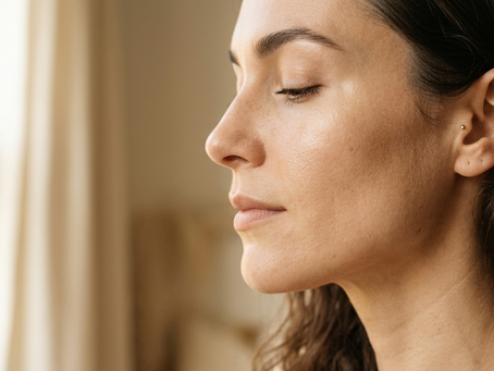 Profile portrait of a woman with luminous, naturally healthy skin in  warm natural light — illustrating the philosophy of preventive aesthetic  medicine at Antonoff Aesthetic, Staten Island