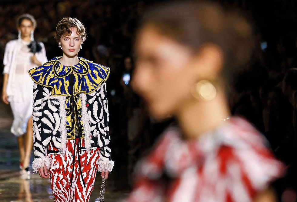 Chanel reveals tiger-print tweed and sheer skirt suits in Paris