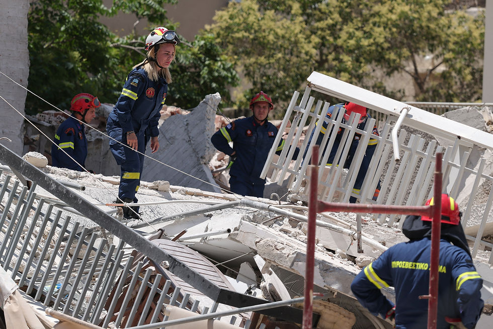 Greek rescuers searching for people trapped after four-story Athens apartment collapses